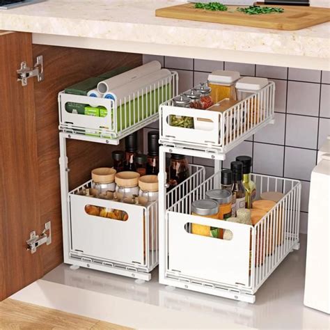 Rangements coulissants et hottes compactes sous meuble