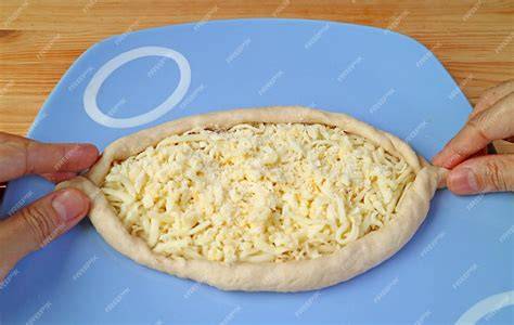 Schéma: schéma de la forme de bateau du khachapuri et repères de pliage