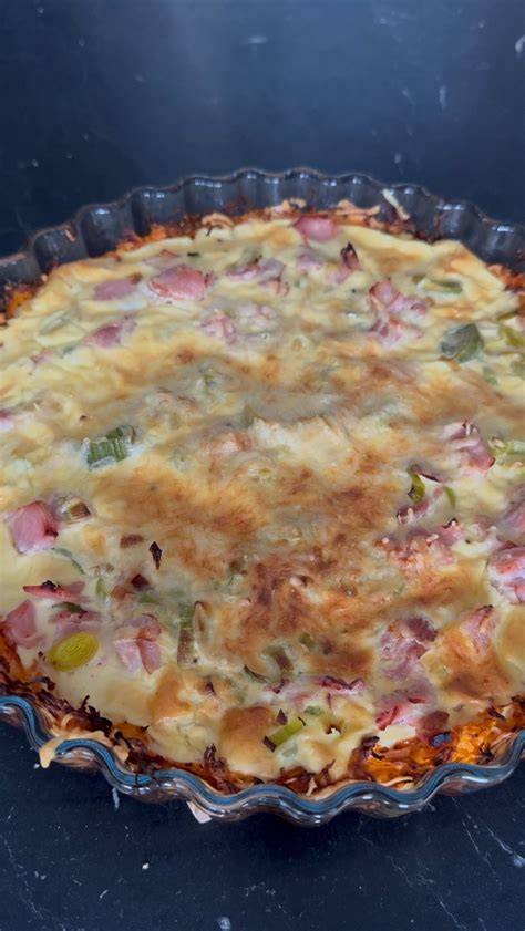 Illustration d’une quiche soufflée prête à enfourner dans un moule