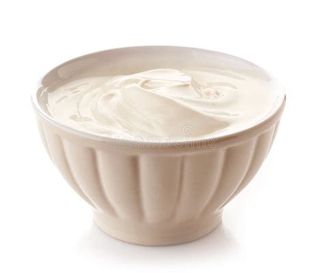 Bol de yaourt grec avec de la crème montée