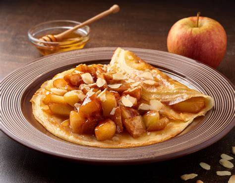 Image: Crêpes moelleuses garnies de pommes caramélisées et calvados