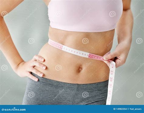 Measuring tape around a waist