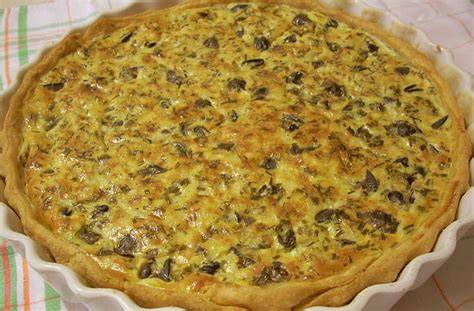 image d une tarte aux escargots et morilles en cuisson