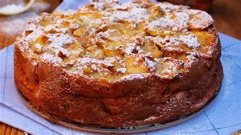 image: gâteau pommes noix, photo de tranche montrant moelleux et croûte dorée