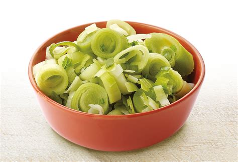 Poireaux et carottes coupés en rondelles