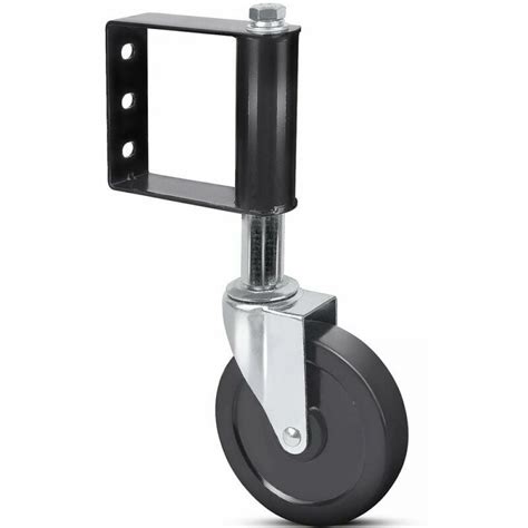 Roulettes de portail en cours de graissage