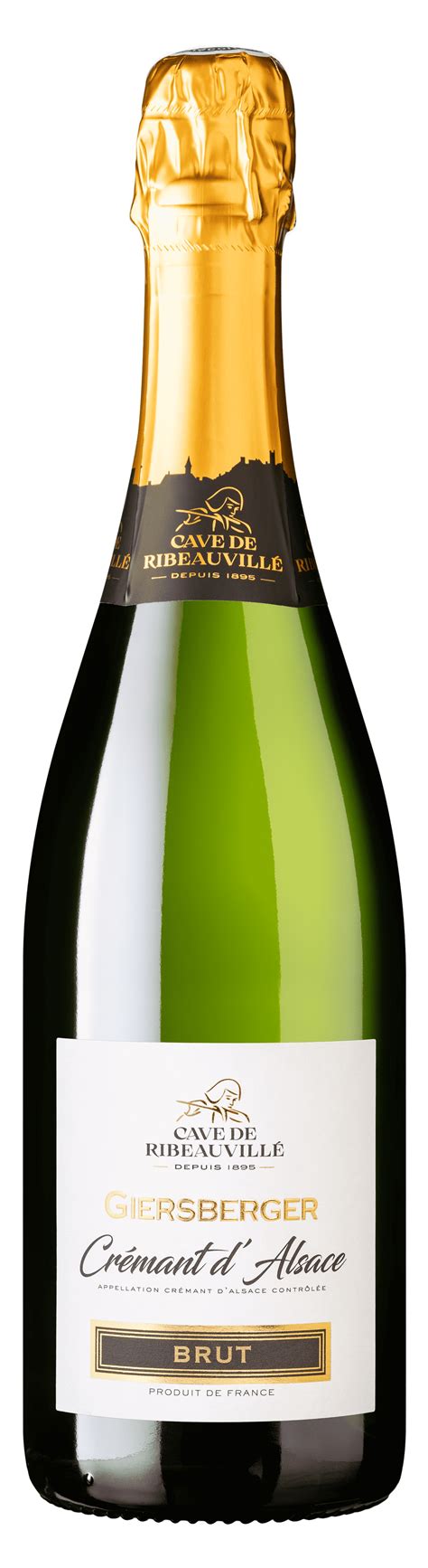 Bouteille de Crémant posée sur un lit de framboises