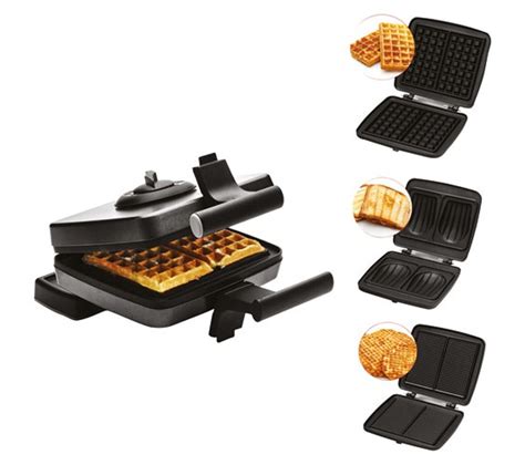 Appareil croque-gaufre ouvert montrant les plaques interchangeables