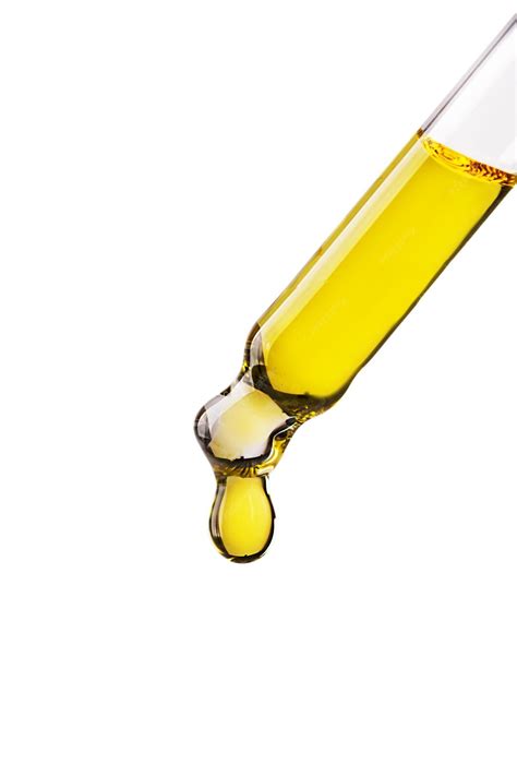 Goutte d'huile sur la peau