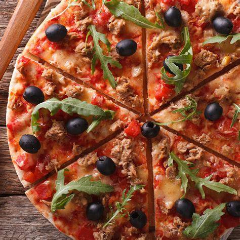 Pizza orientale au thon: plan de cuisson et garniture étalée