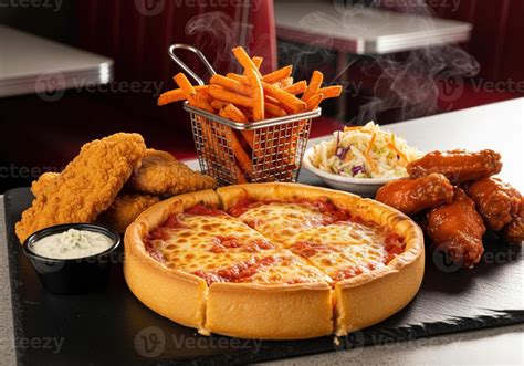 Pizza with chicken tenders and potato cubes