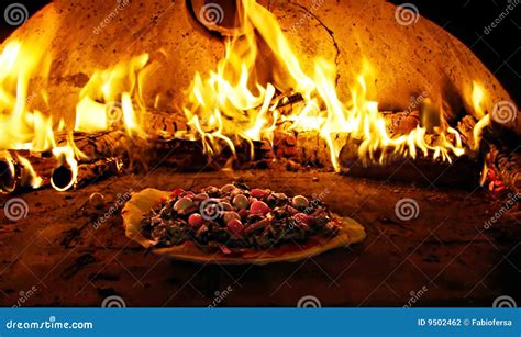 Pizza oven with flames