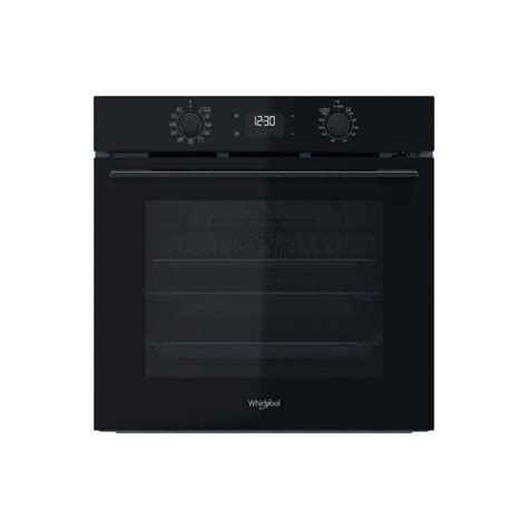 Image d'une cuisine moderne avec un four encastrable Whirlpool intégré