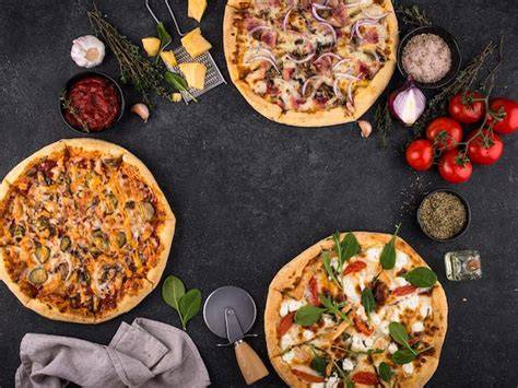 Assortiment de pizzas et accompagnements chez Pizza Bros