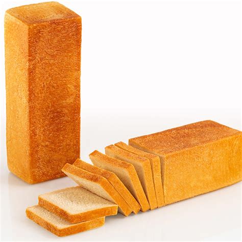 Planches de pain de mie beurrées saupoudrées de curry